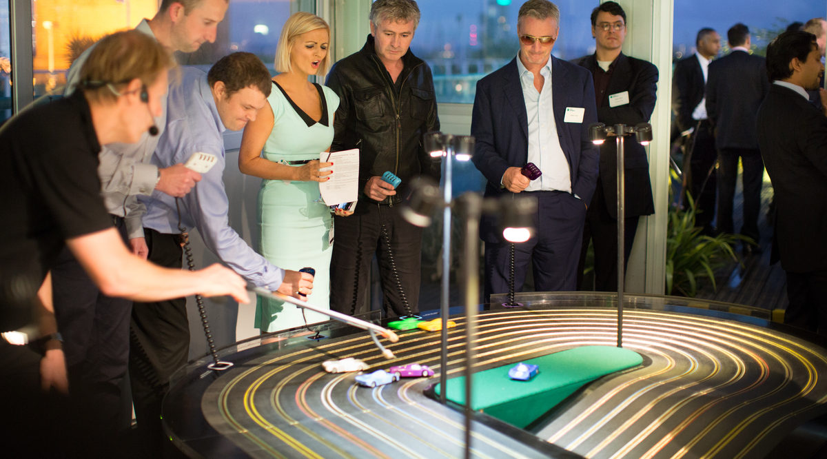 miniracing.com Giant Scalextric 8 lane track for hire being played at an exhibition event