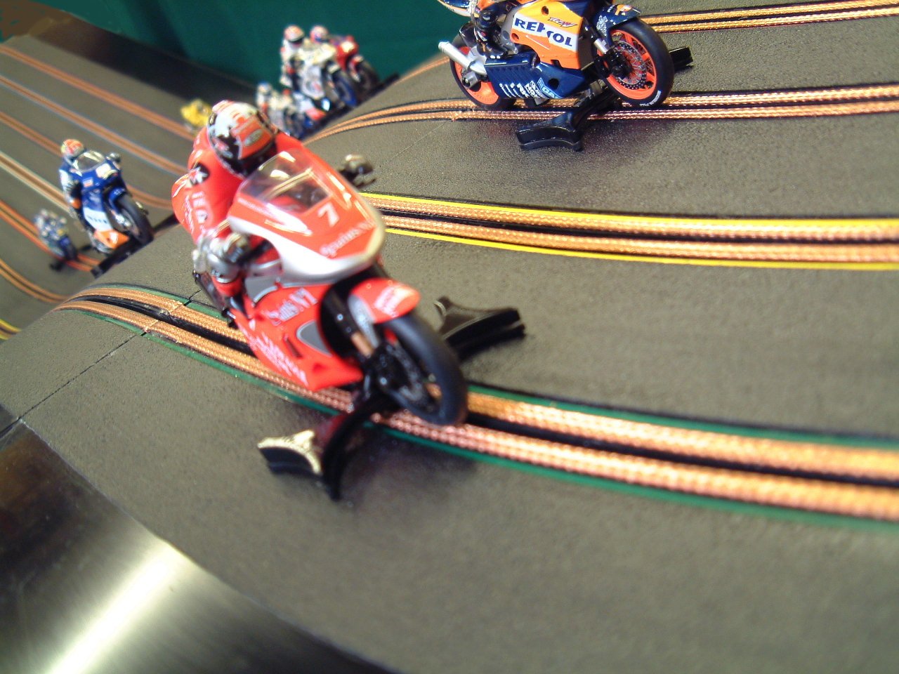 miniracing.com Giant Scalextric 8 Lane track racing with custom made moto GP motorbikes 